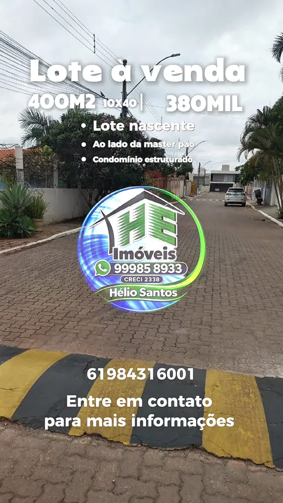 Rua do condomínio com calçada, meio-fio pintado e lombada